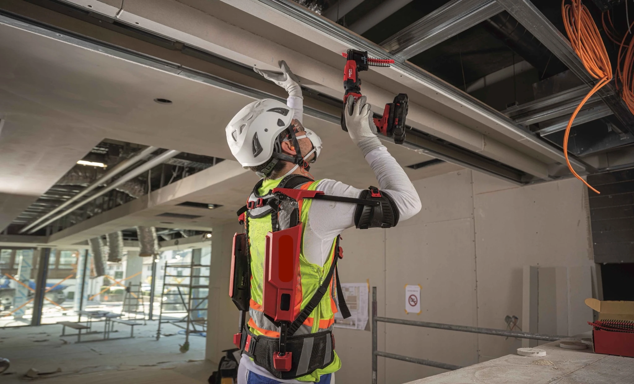 Worker with Hilti EXO-S shoulder exoskeleton