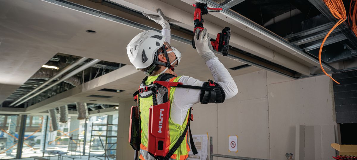 Worker with Hilti EXO-S shoulder exoskeleton