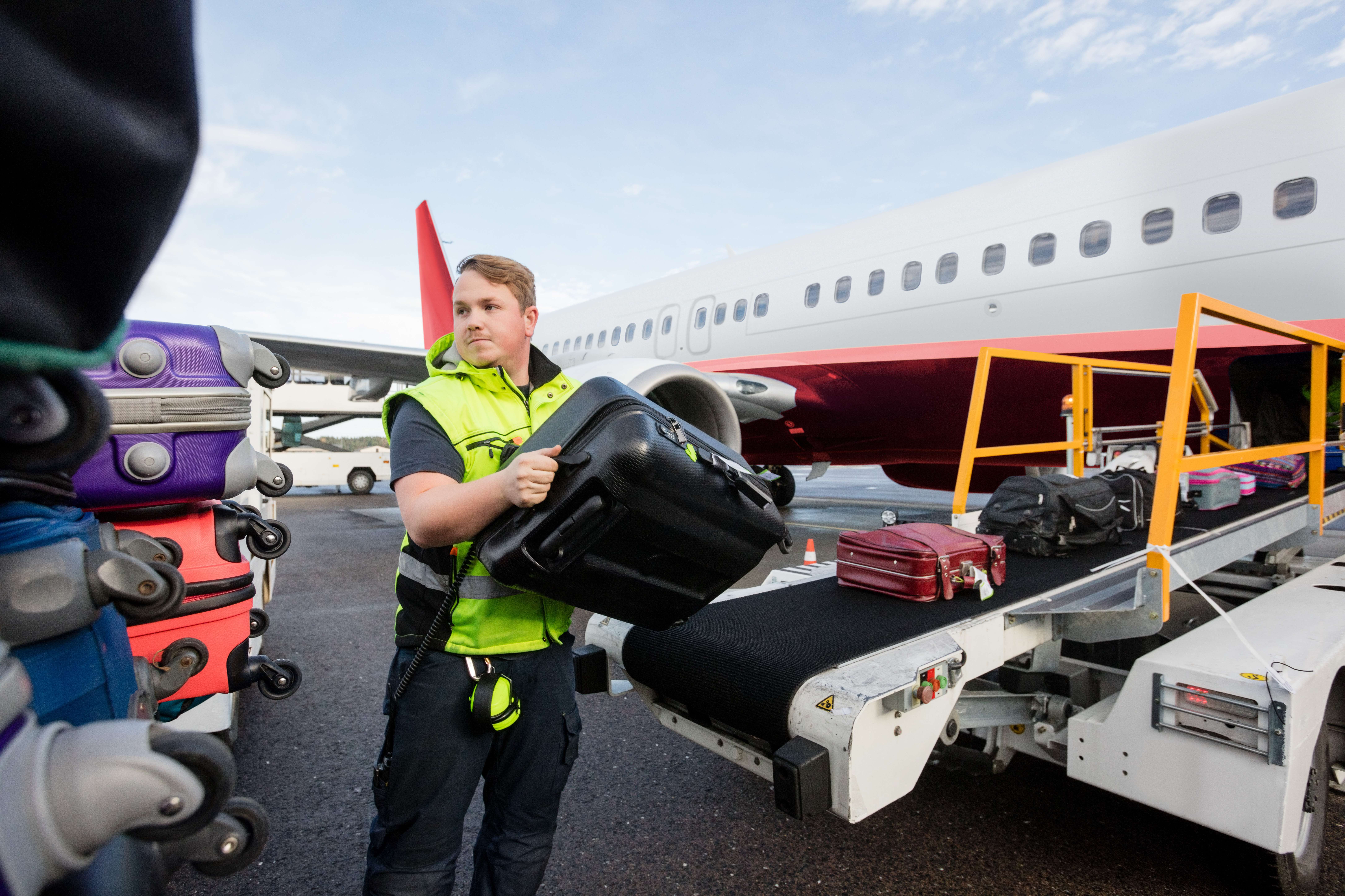 Airport worker wearing exoskeleton