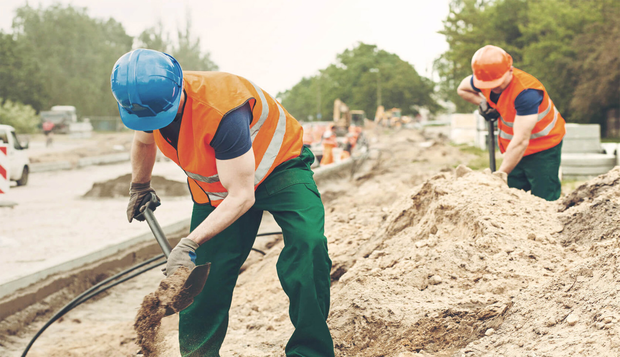 Construction worker wearing exoskeleton